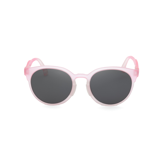 Pink sunglasses with dark lenses on a white background