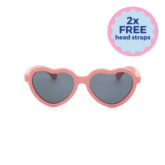 Heart-shaped sunglasses with pink frame and dark lenses on a white background - Two free head straps - Funglasses